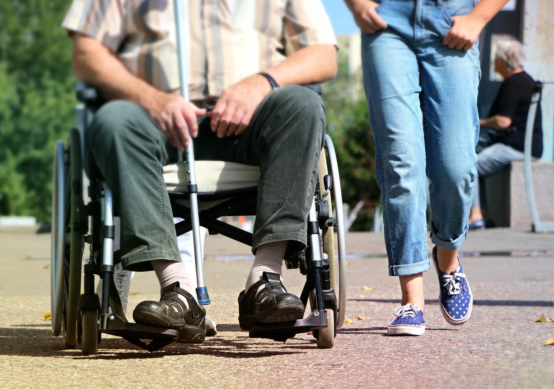 disabled person in wheelchair with company